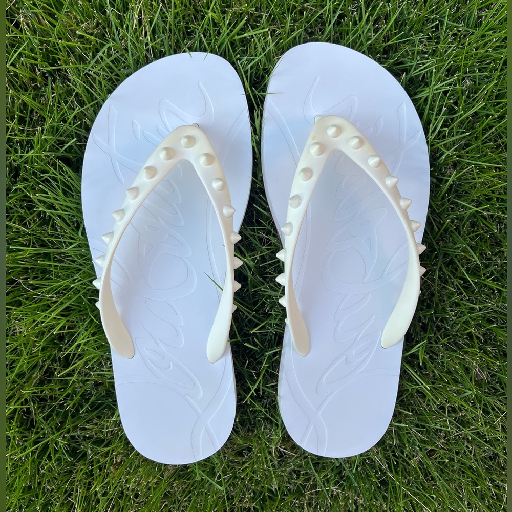 Christian Louboutin spike flip flops